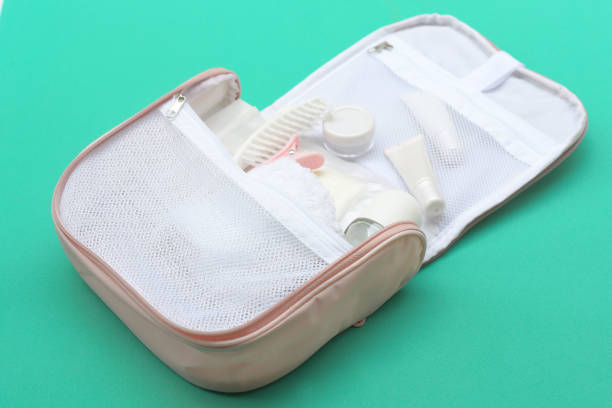 istock Shower set and towel in small bath bag. 947224160