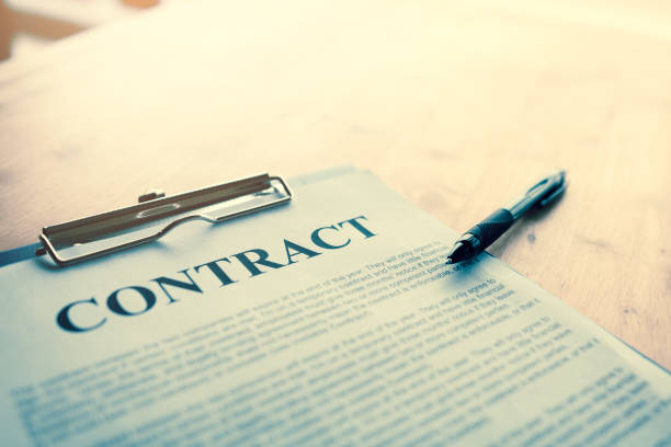 istock Contract paper with pen on desk. 947224302