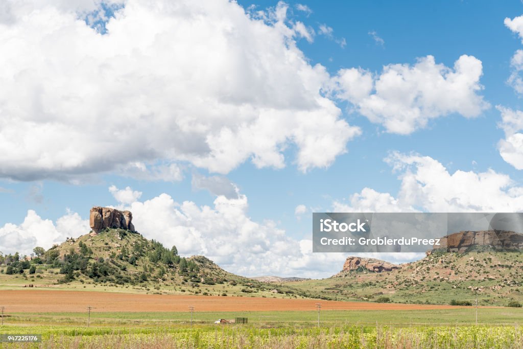 Farm landscape with typical sandstone hills between Ficksburg and Fouriesburg Farm landscape with typical sandstone hills between Ficksburg and Fouriesburg in the Free State Province of South Africa Africa Stock Photo