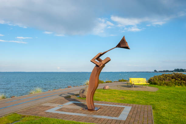 Beach promenade with sculpture \