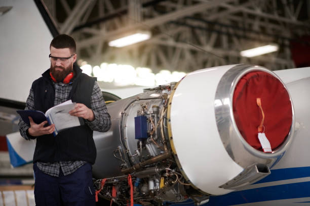 istock Aircraft mechanic in the hangar 947230704