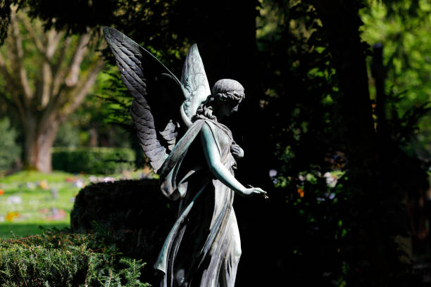 istock Antique Angel Statue at the Melaten Graveyard, Cologne 947234108