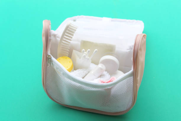 istock Shower set and towel in small bath bag. 947234268