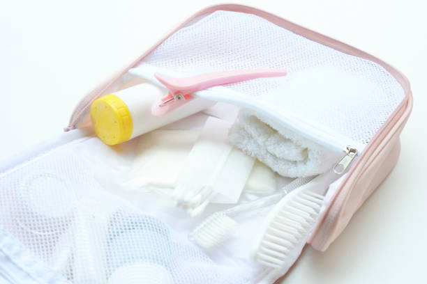 Shower set and towel in small bath bag.