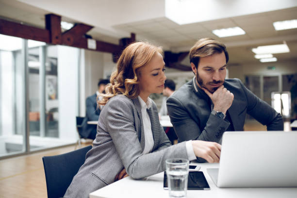 istock Executive explaining business plans to her coworker 947234738