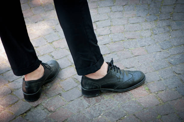 istock black shoes on paving 947237306