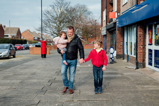 istock Walking to the Shop with Dad 947237418