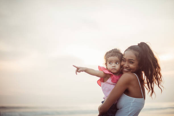 istock Mother holding his child 947241556