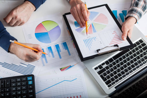 istock Stock market chart and finger pointing 947242644