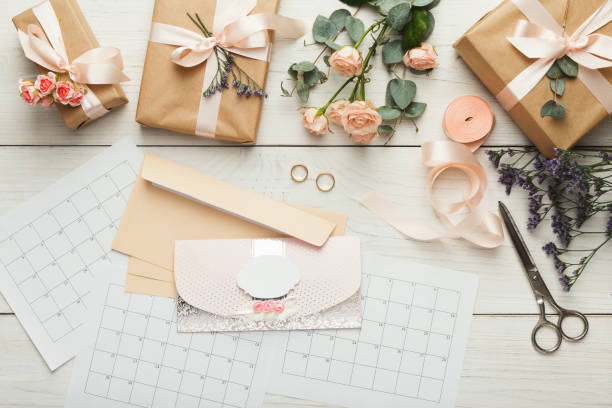 istock Wedding invitation cards and envelopes on white wooden table, to 947242752