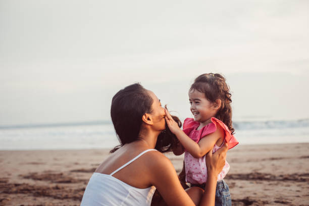 istock Cute family time on beach 947245052