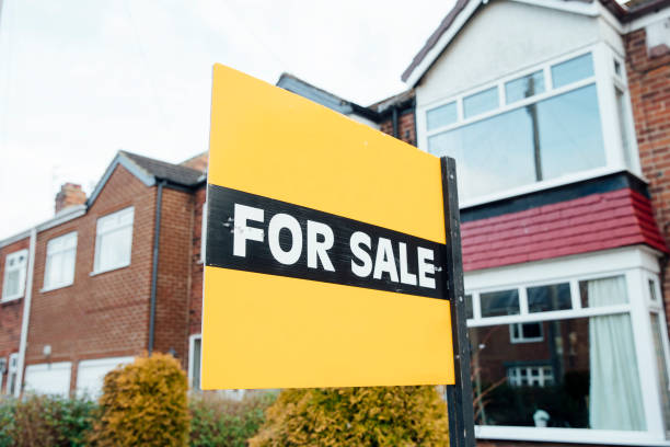 istock For Sale Sign on a House 947245206