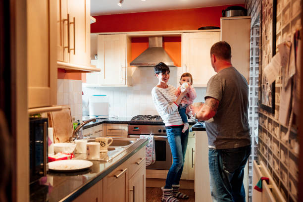 istock Family in the Kitchen with Baby 947246294