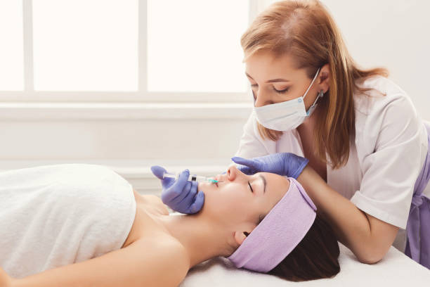 istock Woman getting beauty injection at salon 947252348