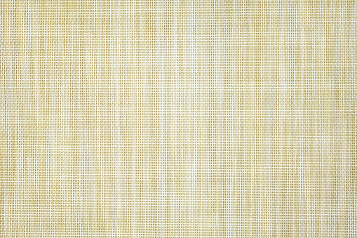 Light brown synthetic weave background.