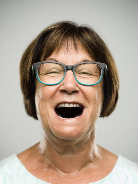 real shouting senior woman portrait - mouth open imagens e fotografias de stock