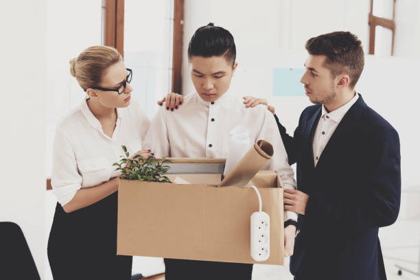 istock HR director woman is working in office. Coworker is getting fired. 947256186