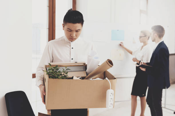 istock HR director woman is working in office. Coworker is getting fired. 947256558