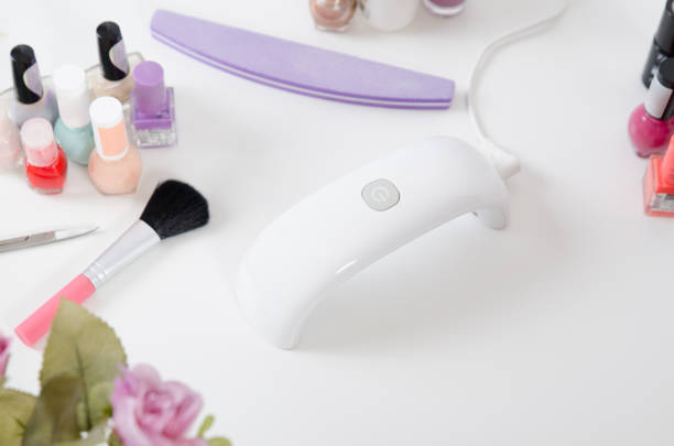 istock UV light dryer. Manicure, spa salon concept. 947264806