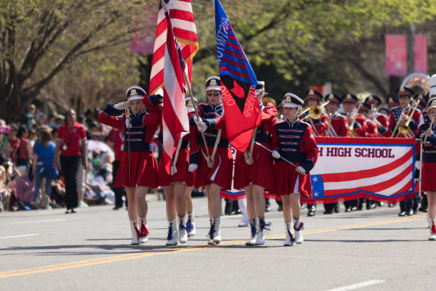 National Cherry Blossom Parade 2018 Washington, D.C., USA - April 14, 2018 Austintown Fitch High School Marching Band in the 2018 National Cherry Blossom Parade youngstown stock pictures, royalty-free photos & images