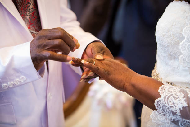 istock Rings exchange for black couple marriage 947271876