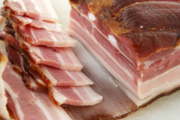 istock Smoked bacon in slices. 947272216