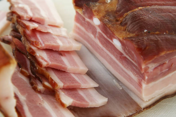 istock Smoked bacon in slices. 947272286