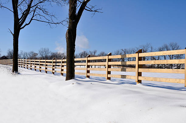 istock wood fence by snow 94727741