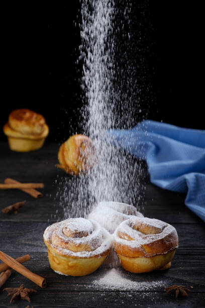 Cinnamon rolls with powdered sugar.