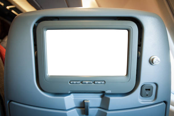 istock Blank Screen on Passenger Seat of Airplane 947294162