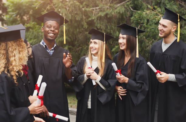 istock A group of graduates celebrating 947294802
