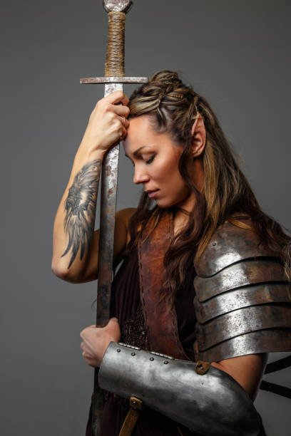 istock Fantastic woman warrior with sword. 947294908