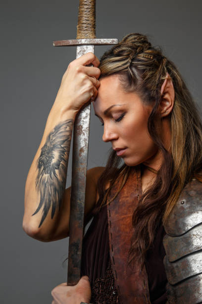 istock Fantastic woman warrior with sword. 947295092