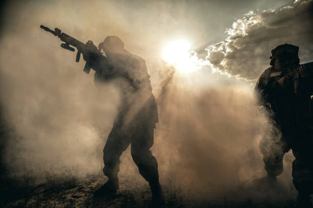 istock US Marines in action. Desert heat 947295546