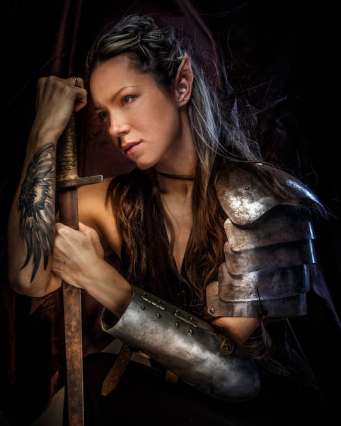 Premium Photo  A woman with a tattoo on her chest is holding a sword