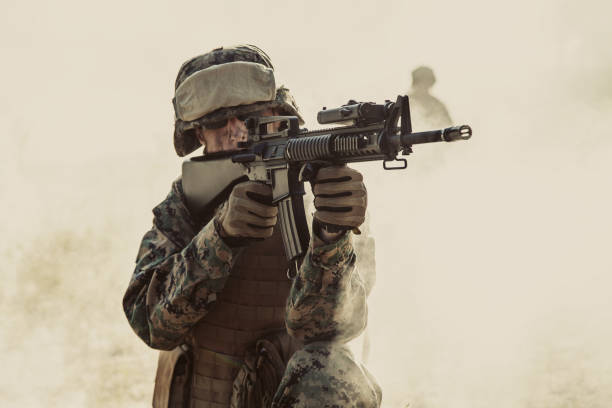 istock US Marines in action. Desert sandstorm 947295684