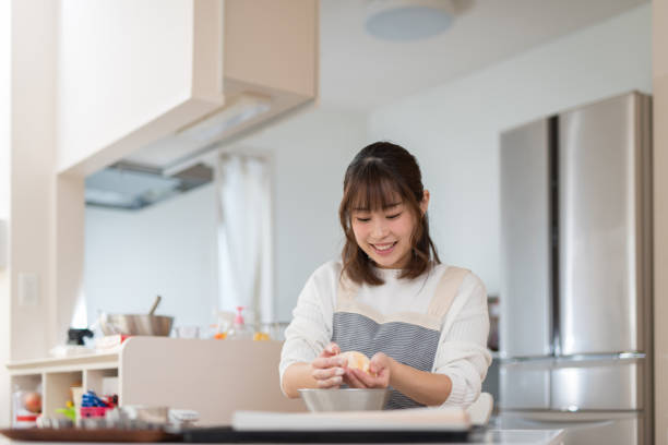 Housewife making cookie in kitchen