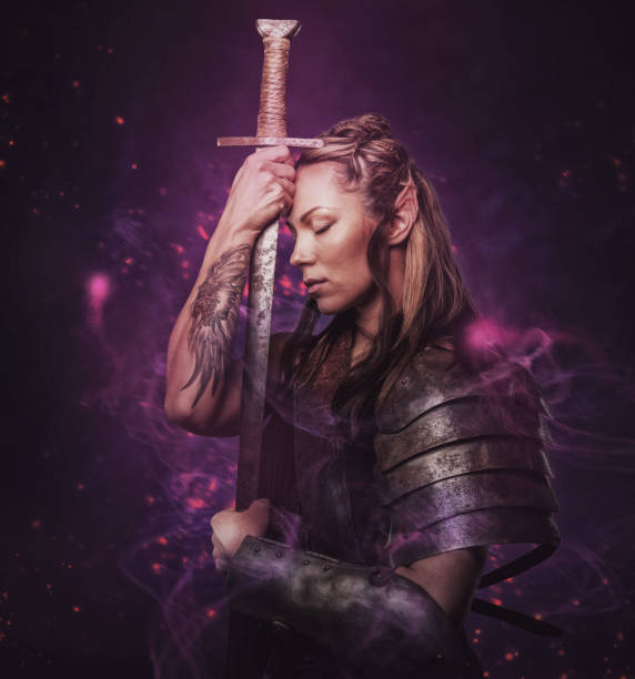 istock Elf woman holding sword 947299020