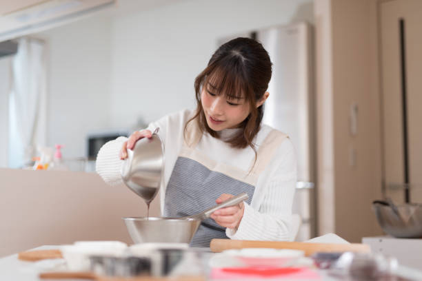 istock Woman making chocolate pastry in kitchen 947299688