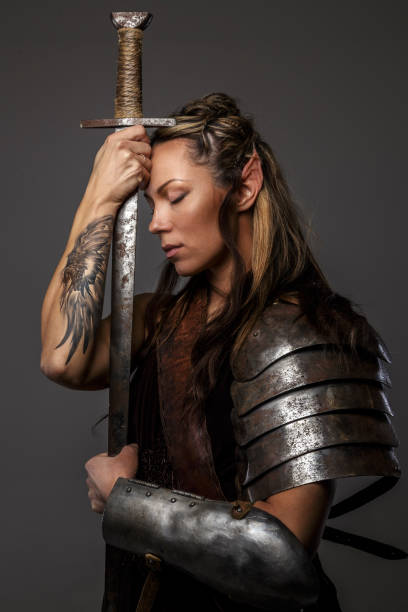 istock Elf woman holding sword 947300328