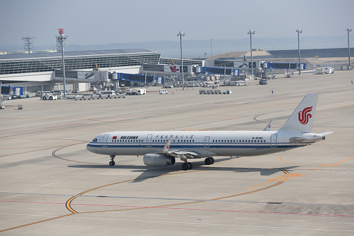 Tokoname, Japan - March 26, 2018 : Air China Airbus A321 airplane at Chubu Centrair International Airport in Tokoname, Aichi Prefecture, Japan.