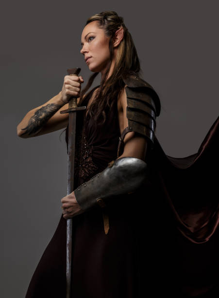istock Elf woman holding sword 947300700