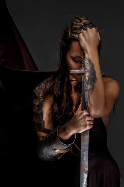 istock Elf woman holding sword 947300832