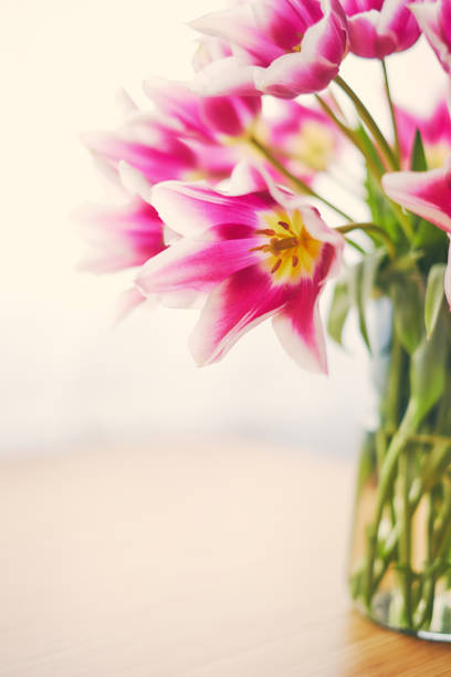 istock Pink tulips in a vase 947303826