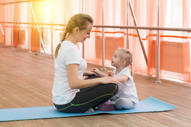istock Doing sports with moms and daughters. 947309040