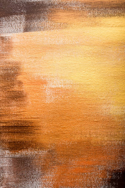 istock Abstract golden painted background, brush strokes 947309198