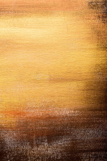 istock Abstract golden painted background, brush strokes 947309210