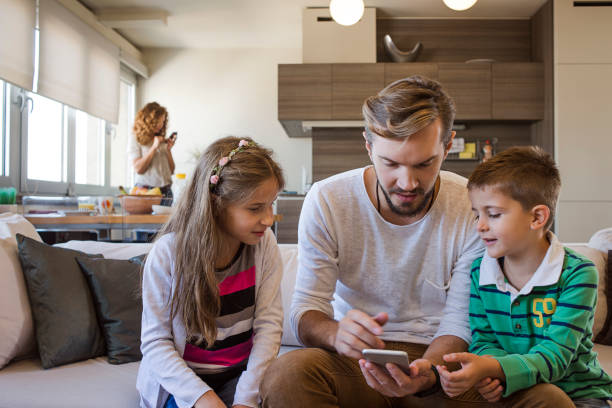 istock father playing games with his children 947313528
