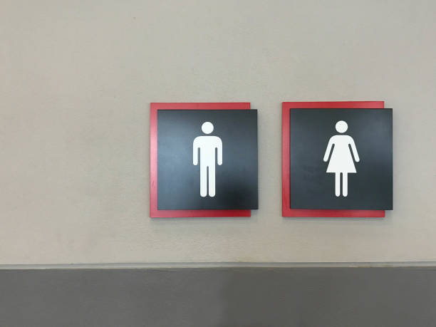 istock Modern toilet sign on gray cement wall 947319304