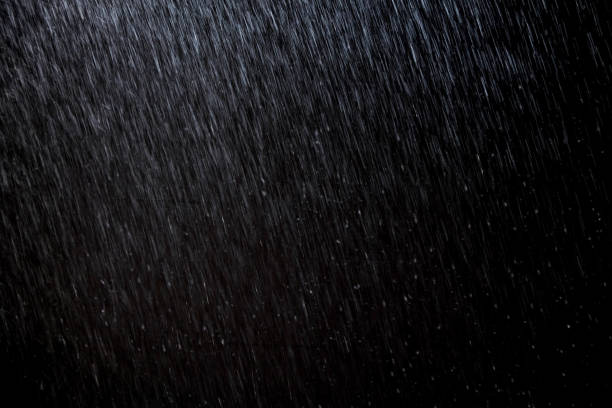 istock abstract rain texture background. background rain in night light 947319382